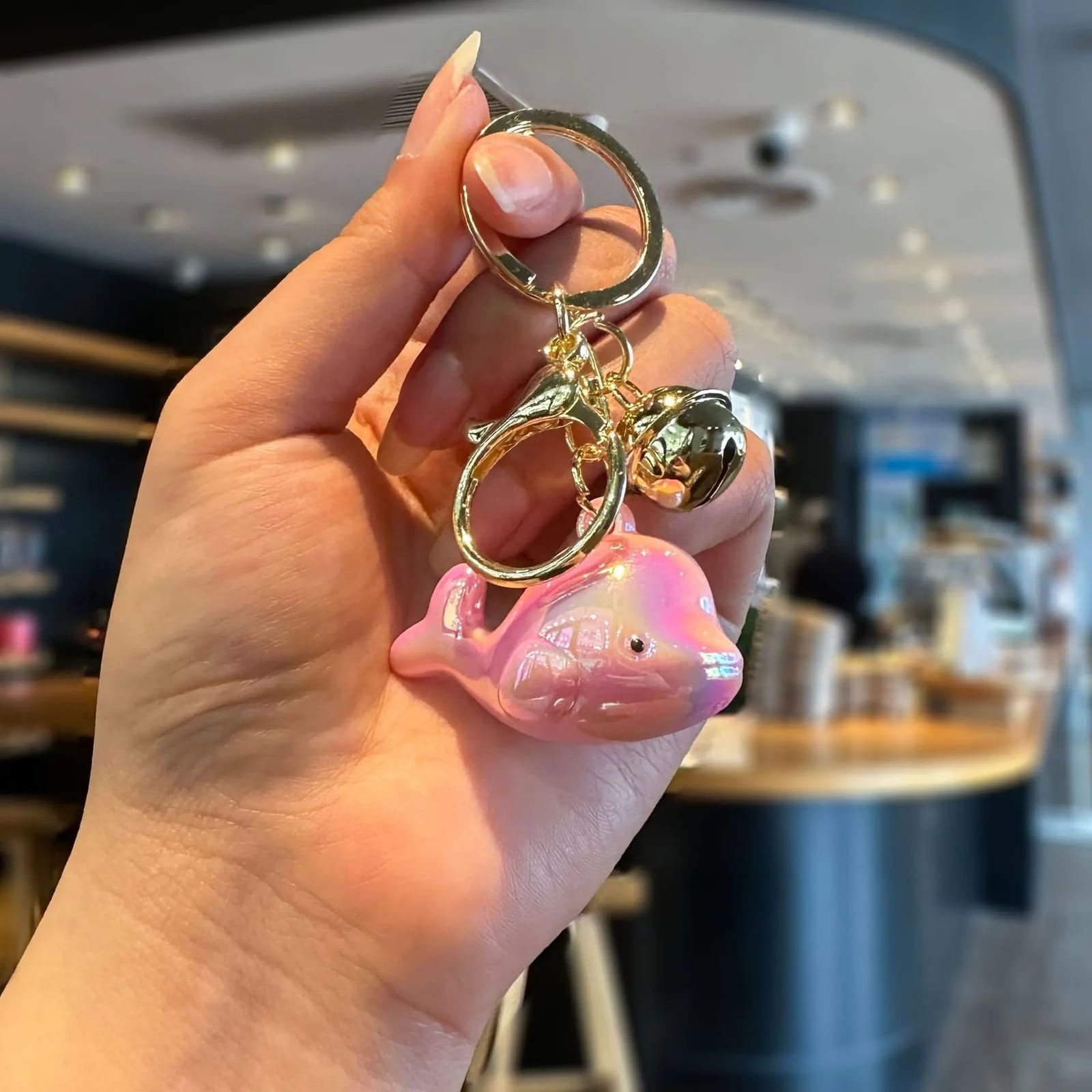Creative electroplated iridescent dolphin acrylic keychain pendant, cute color-changing bell, colorful student backpack pendant