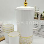 Plastic water jug with 4cups.